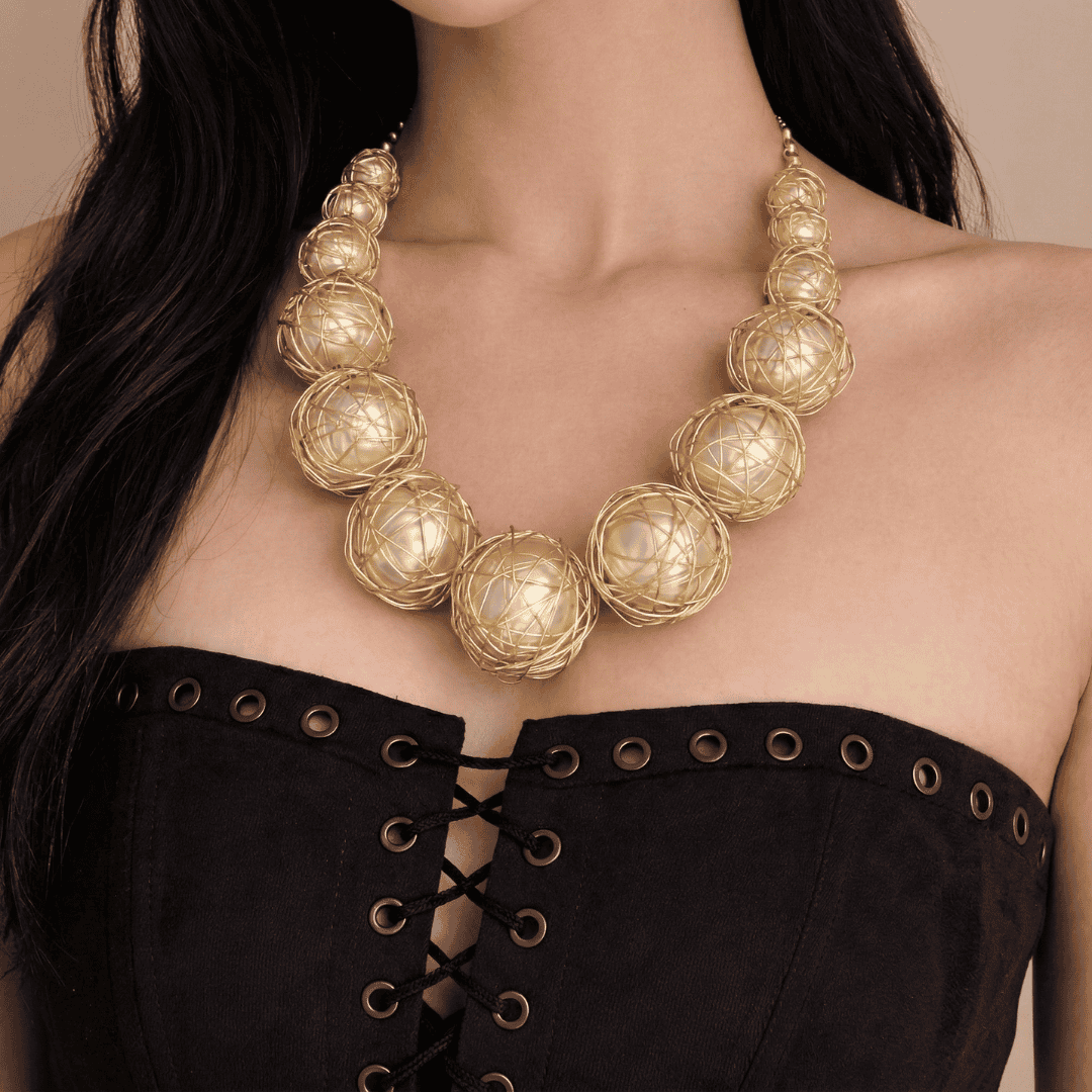 Celestial Orbit - A Golden Wrapped Orb Statement Necklace
