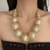 Celestial Orbit - A Golden-Wrapped Orb Statement Necklace