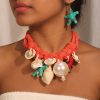 CORAL TIDE- A SEASHELL PEARL CHOKER & EARRINGS SET